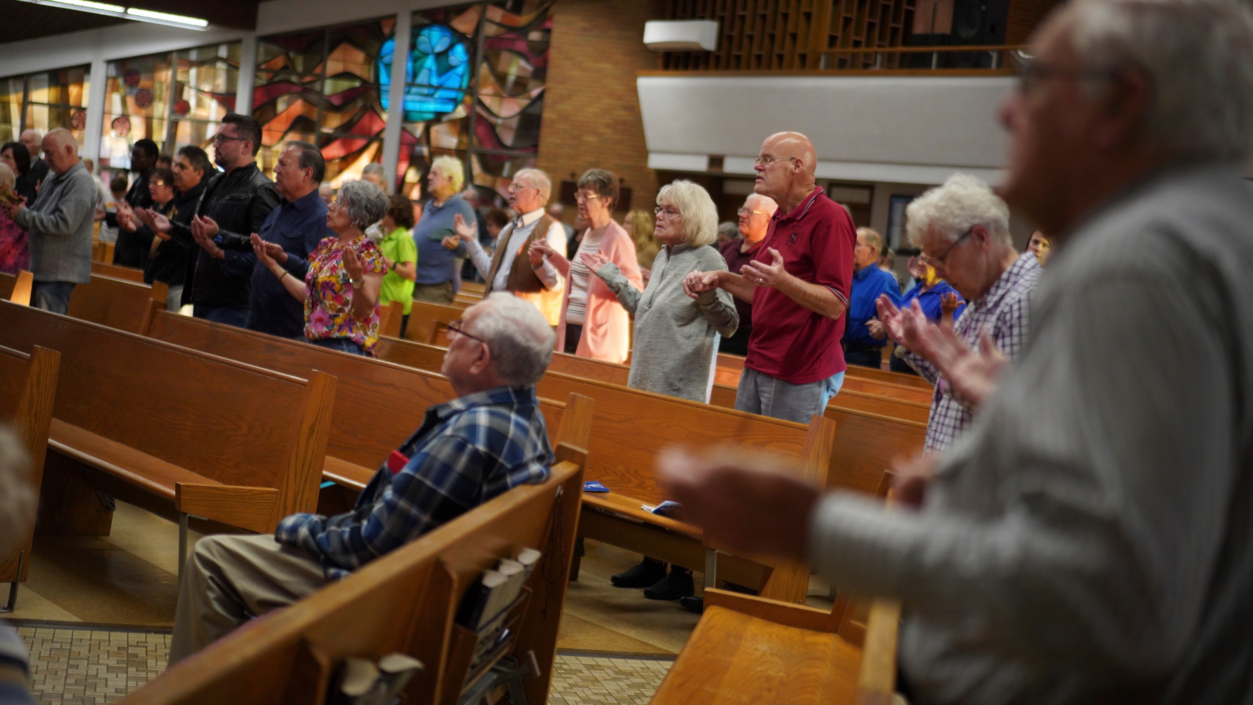 Congregants attend the English-language Mass at St. Mary’s Catholic Church on Saturday, Oct. 19, 2024, in Worthington, Minn. (AP Photo/Jessie Wardarski)