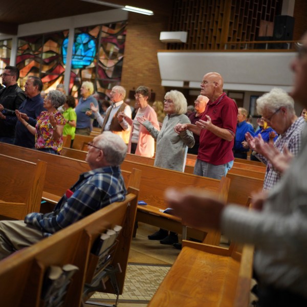 Congregants attend the English-language Mass at St. Mary’s Catholic Church on Saturday, Oct. 19, 2024, in Worthington, Minn. (AP Photo/Jessie Wardarski)