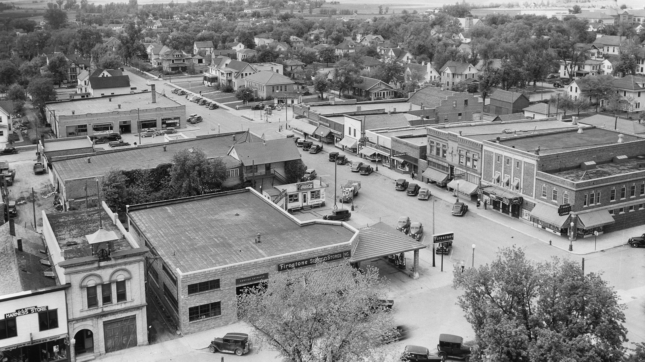 This 1940s photo provided by The Globe, Worthington, shows local businesses in downtown Worthington, Minn. (The Globe, Worthington via AP)