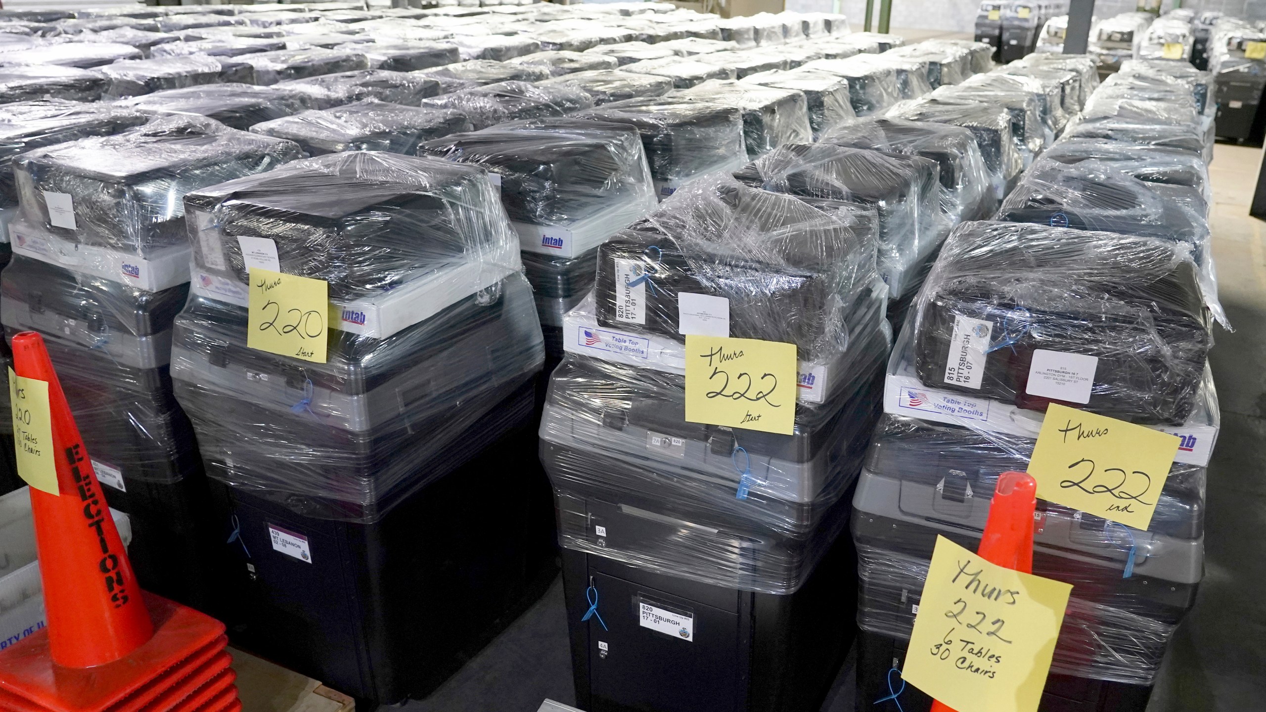 Voting machines are prepared for use on Election Day at the Allegheny County Elections Division warehouse, Wednesday, Oct. 30, 2024, in Pittsburgh. (AP Photo/Matt Freed)