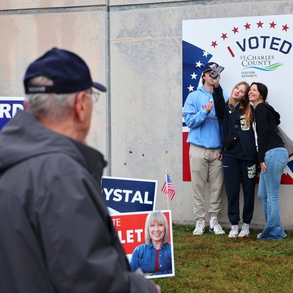 First time voters Efton, left, and Eliza Owens, center, take a selfie with their mother Kourtney Owens outside the St. Charles County Election Authority as early voting continues on Thursday, Oct. 31, 2024 in St. Peters, Mo. (Robert Cohen/St. Louis Post-Dispatch via AP)