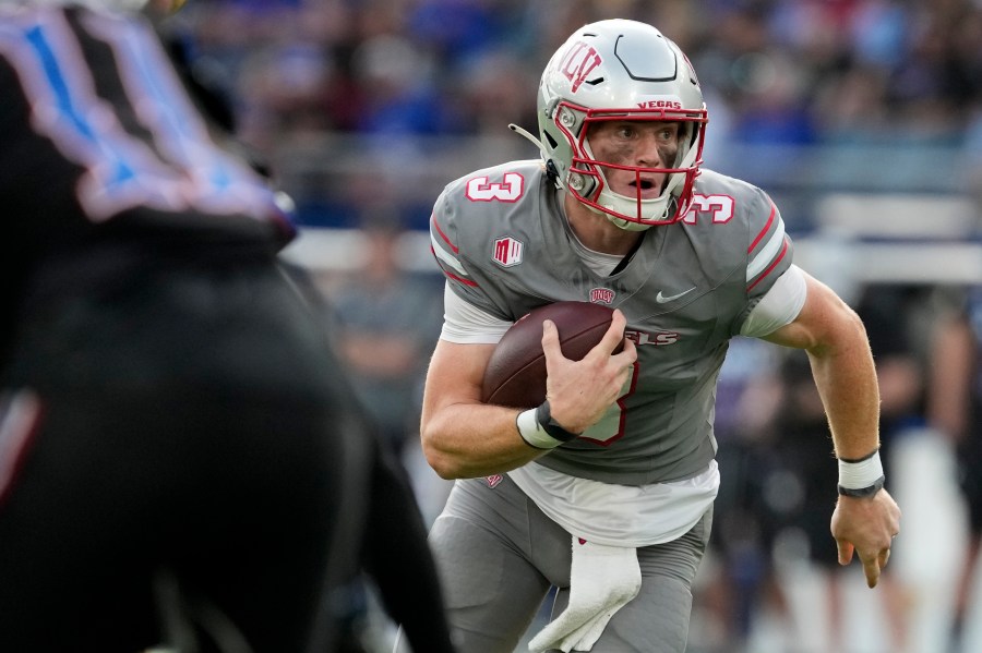 FILE - UNLV quarterback Matthew Sluka runs the ball against Kansas in the first half of an NCAA college football game Friday, Sept. 13, 2024, at Children's Mercy Park in Kansas City, Kan. (AP Photo/Ed Zurga, File)