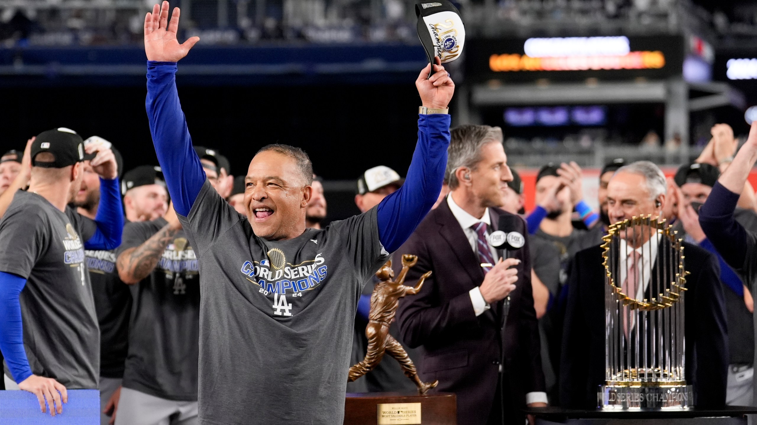 Los Angeles Dodgers manager Dave Roberts celebrates their win against the New York Yankees in Game 5 to win the baseball World Series, Thursday, Oct. 31, 2024, in New York. (AP Photo/Ashley Landis)