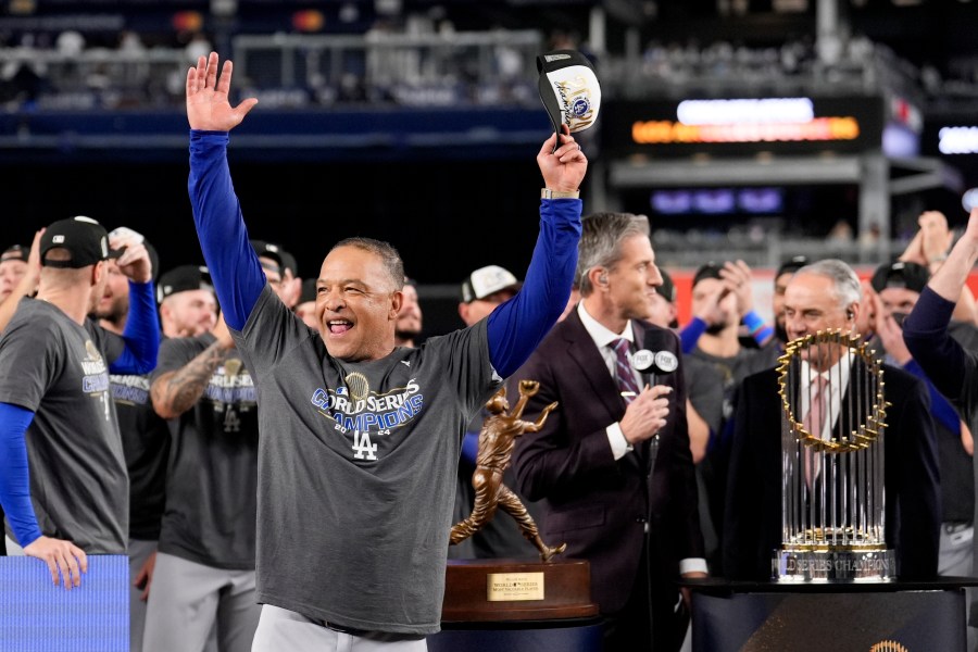 Los Angeles Dodgers manager Dave Roberts celebrates their win against the New York Yankees in Game 5 to win the baseball World Series, Thursday, Oct. 31, 2024, in New York. (AP Photo/Ashley Landis)