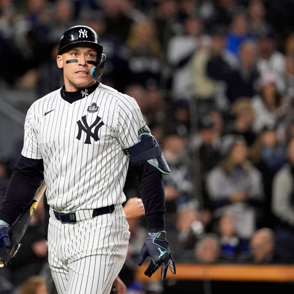 New York Yankees' Aaron Judge walks back to the dugout after striking out against the Los Angeles Dodgers during the first inning in Game 3 of the baseball World Series, Monday, Oct. 28, 2024, in New York. (AP Photo/Godofredo A. Vásquez)