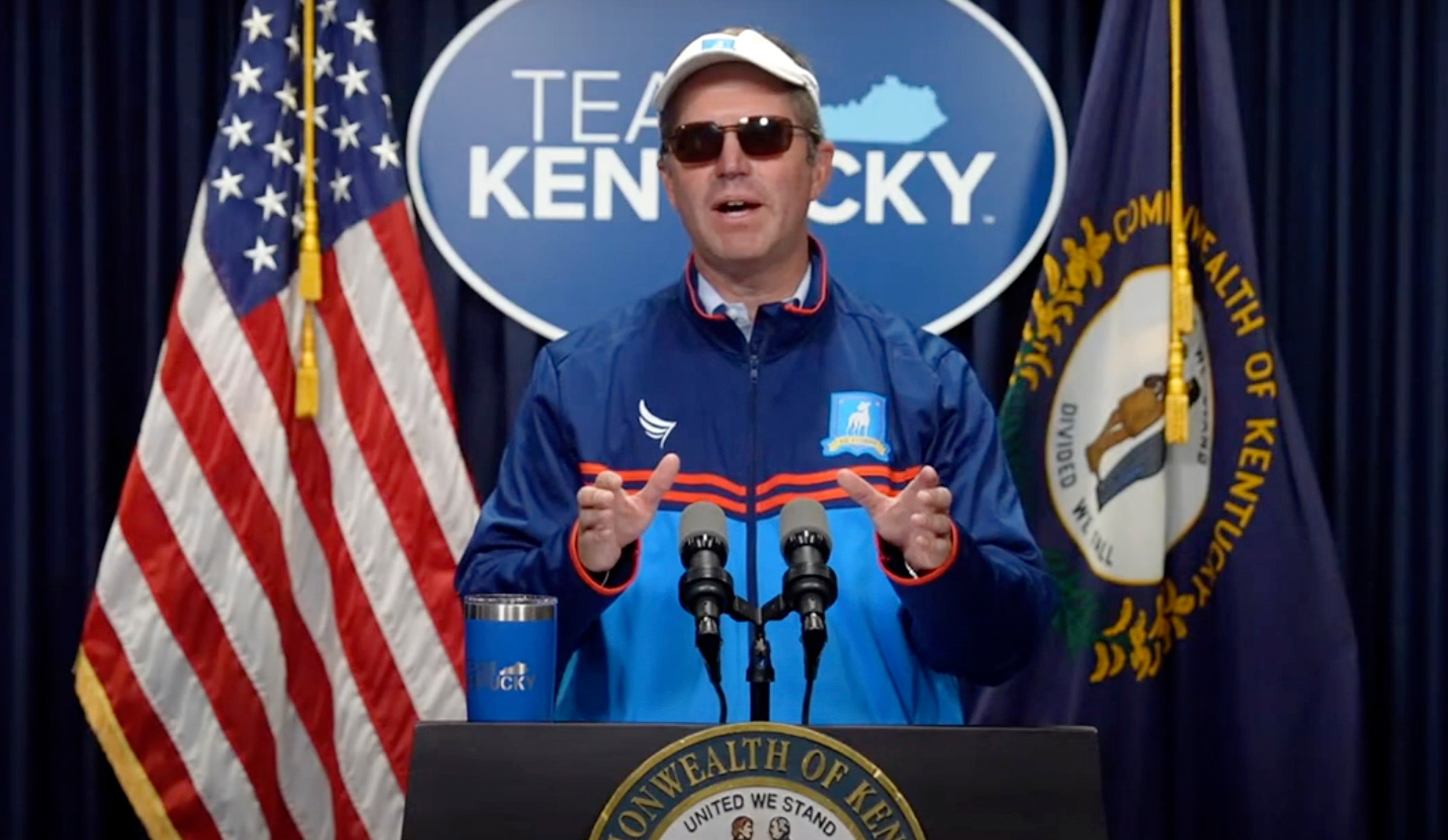 In this image taken from video provided by Kentucky Gov. Andy Beshear, Gov. Beshear shows off his Halloween spirit, decked out as fictional soccer coach Ted Lasso, during a press conference Thursday, Oct. 31, 2024, in Frankfort, Ky. (Kentucky Gov. Andy Beshear via AP)