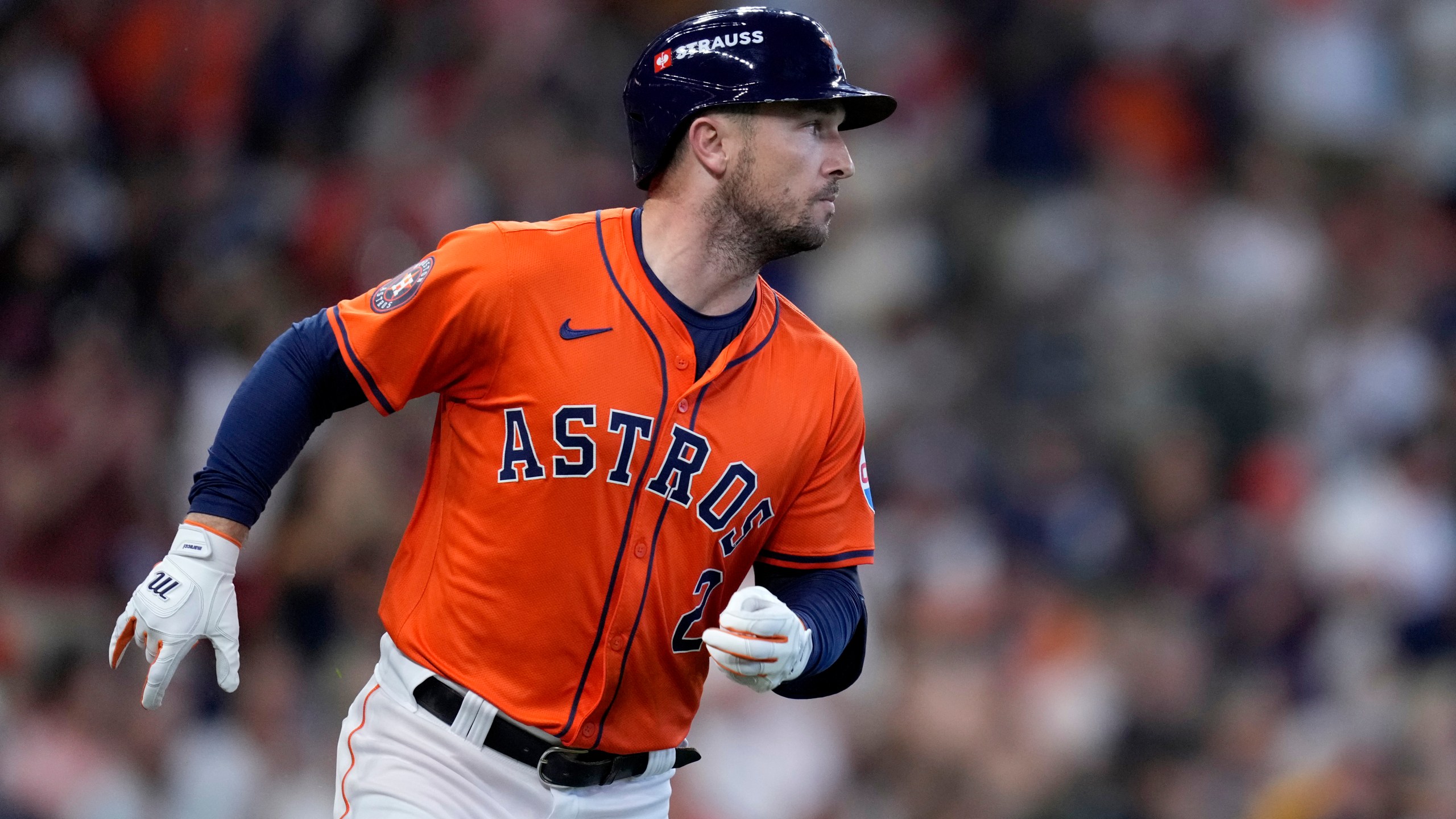 Houston Astros' Alex Bregman sprints to first after hitting for a single against the Detroit Tigers in the second inning of Game 2 of an AL Wild Card Series baseball game Wednesday, Oct. 2, 2024, in Houston. (AP Photo/Kevin M. Cox)