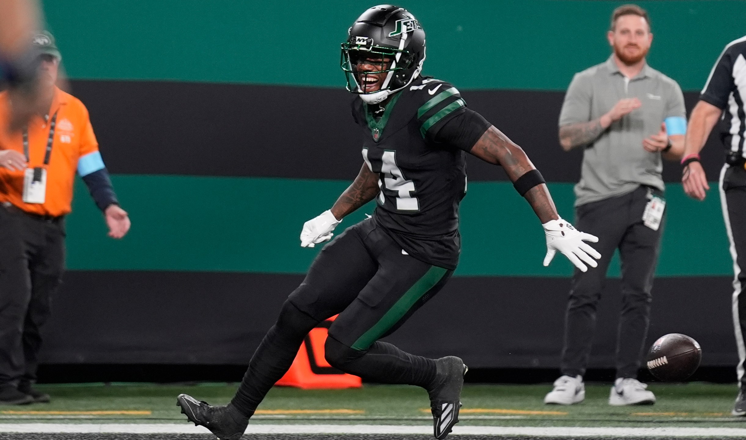 New York Jets wide receiver Malachi Corley drops the football before scoring a touchdown during the first half an NFL football game against the Houston Texans, Thursday, Oct. 31, 2024, in East Rutherford, N.J. (AP Photo/Seth Wenig)