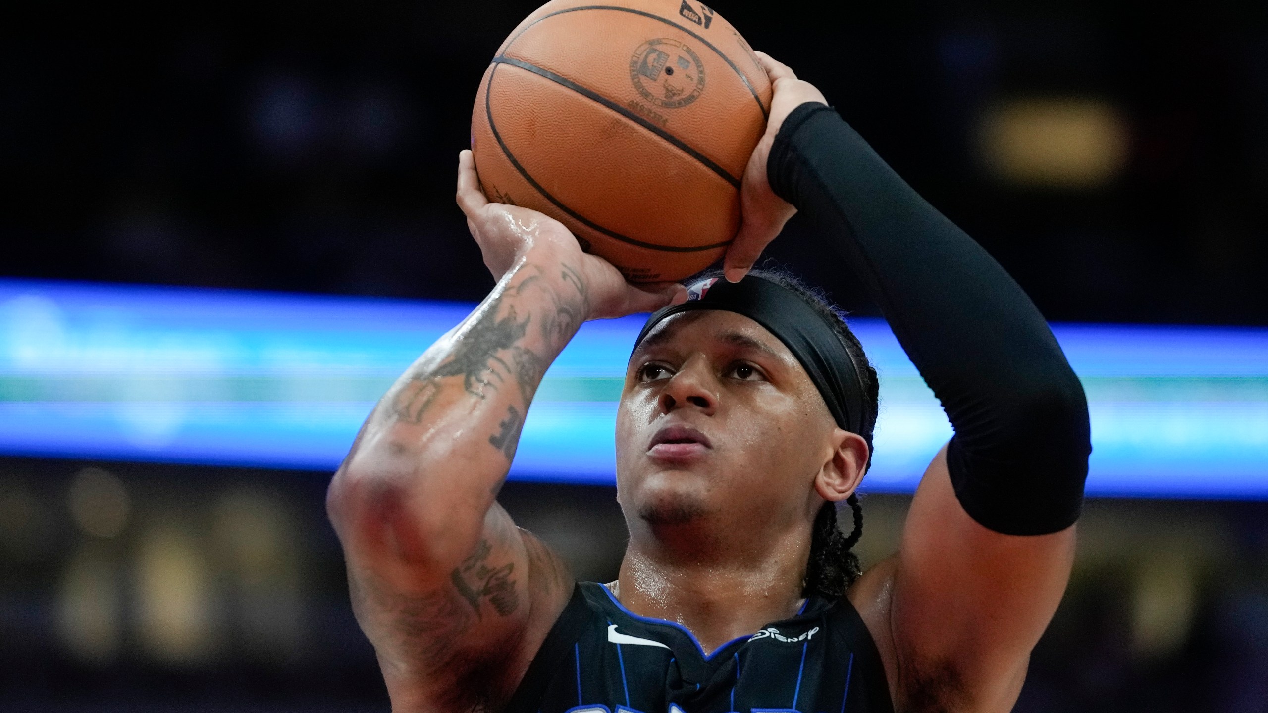 Orlando Magic forward Paolo Banchero shoots a free throw during the first half of an NBA basketball game against the Chicago Bulls, Wednesday, Oct. 30, 2024, in Chicago. (AP Photo/Erin Hooley)