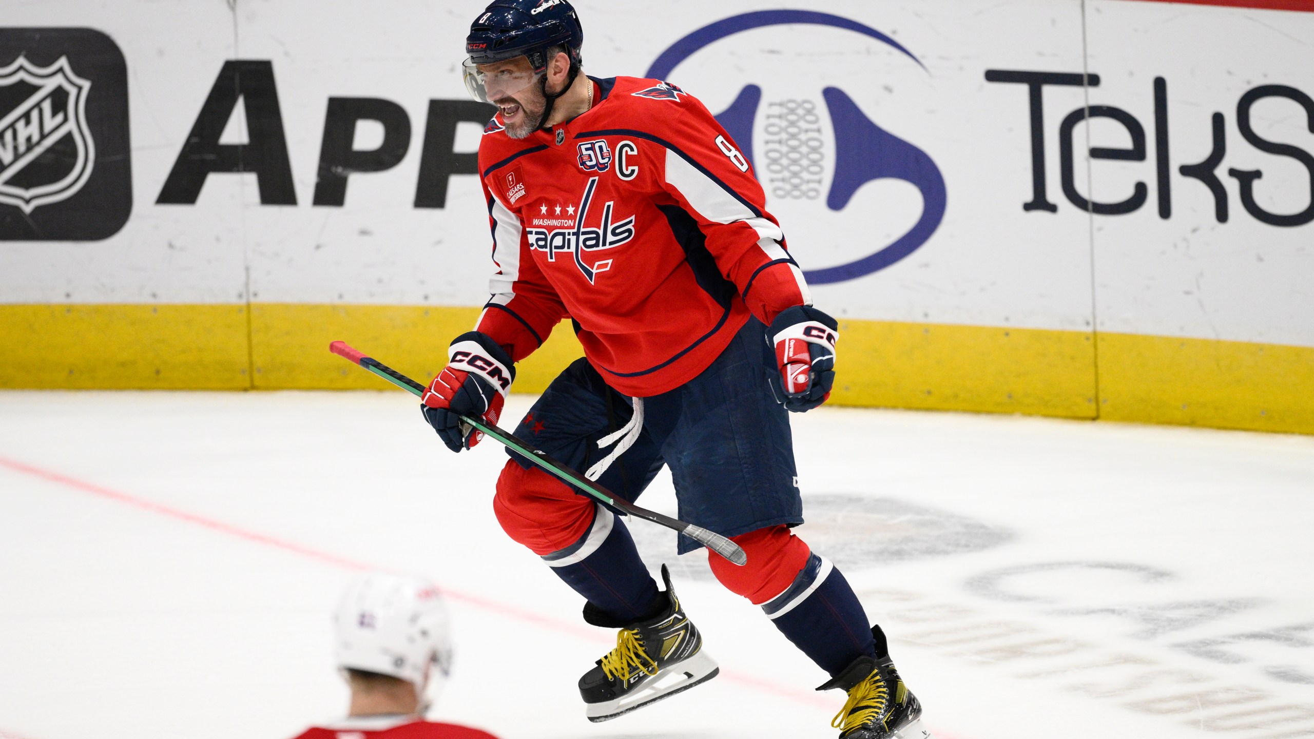 Washington Capitals left wing Alex Ovechkin (8) celebrates his goal during the third period of an NHL hockey game against the Montreal Canadiens, Thursday, Oct. 31, 2024, in Washington. The Capitals won 6-3. (AP Photo/Nick Wass)