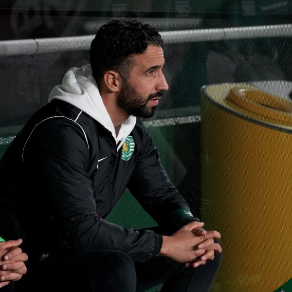 Sporting's head coach Ruben Amorim, who Manchester United has expressed an interest in hiring, sits on the bench during a Portuguese League Cup soccer match between Sporting CP and Nacional at the Alvalade stadium in Lisbon, Tuesday, Oct. 29, 2024. (AP Photo/Ana Brigida)