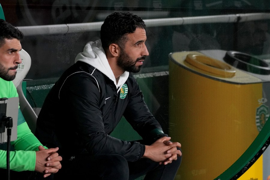 Sporting's head coach Ruben Amorim, who Manchester United has expressed an interest in hiring, sits on the bench during a Portuguese League Cup soccer match between Sporting CP and Nacional at the Alvalade stadium in Lisbon, Tuesday, Oct. 29, 2024. (AP Photo/Ana Brigida)