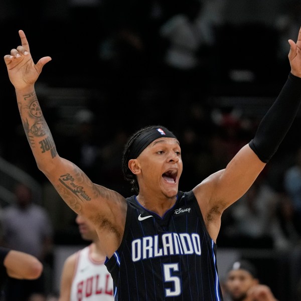 Orlando Magic forward Paolo Banchero reacts to sinking a 3-point shot before it was called no good during the second half of an NBA basketball game against the Chicago Bulls, Wednesday, Oct. 30, 2024, in Chicago. (AP Photo/Erin Hooley)