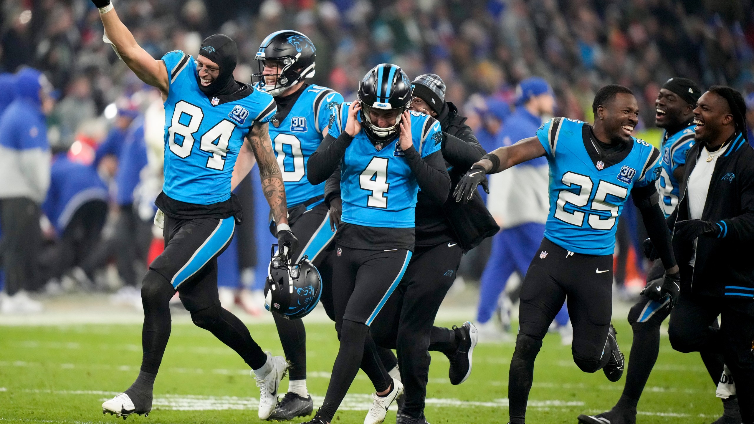 Carolina Panthers kicker Eddy Pineiro celebrates after kicking the game-winning field goal in overtime against New York Giants during an NFL football game, Sunday, Nov. 10, 2024, in Munich, Germany. (AP Photo/Matthias Schrader)