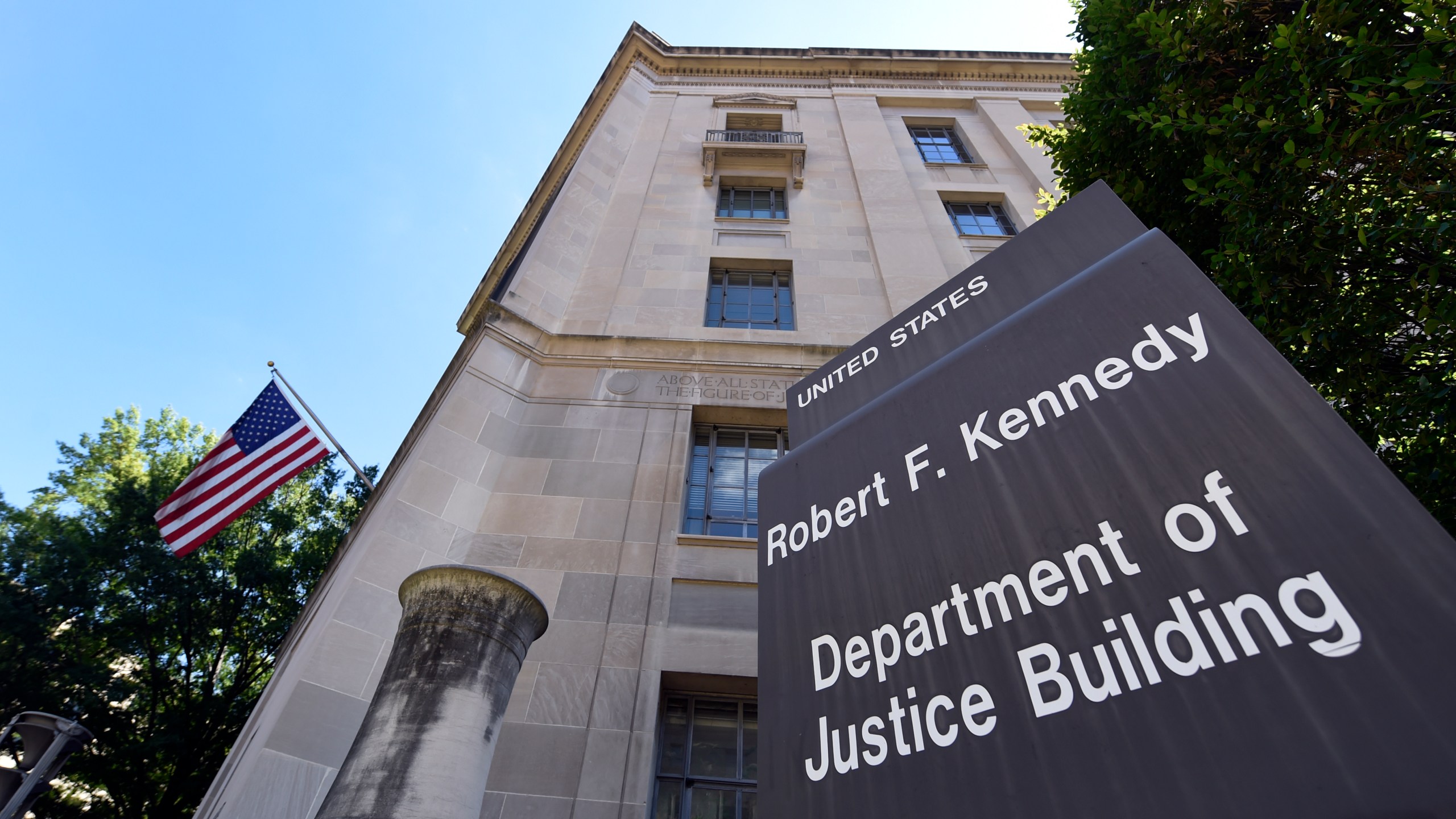 FILE - The view of the Justice Department in Washington, Thursday, Aug. 27, 2015. (AP Photo/Susan Walsh, File)