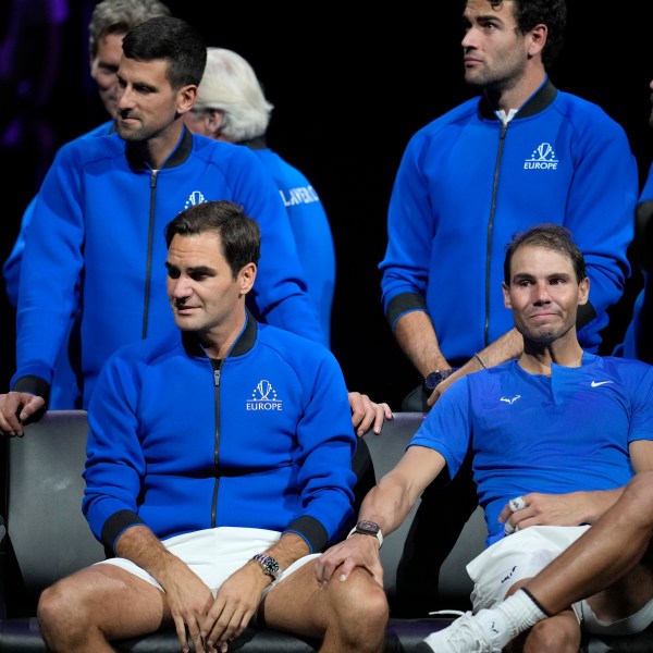 FILE - An emotional Roger Federer of Team Europe is consoled by his playing partner Rafael Nadal after their Laver Cup doubles match against Team World's Jack Sock and Frances Tiafoe at the O2 arena in London, Friday, Sept. 23, 2022. (AP Photo/Kin Cheung, File)