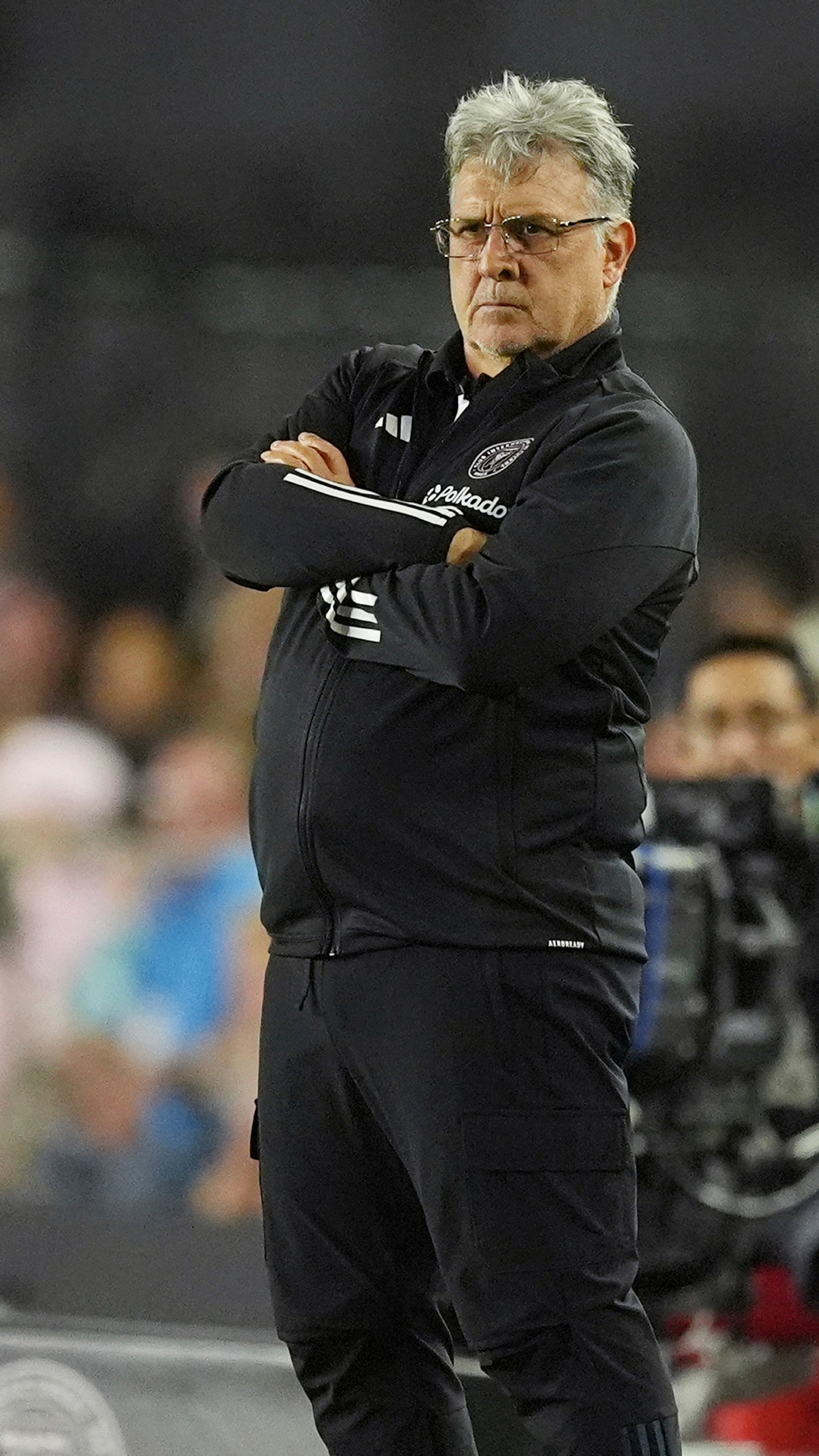 Inter Miami head coach Gerardo "Tata" Martino stands on the sidelines during the first half of an MLS playoff opening round soccer match against Atlanta United, Saturday, Nov. 9, 2024, in Fort Lauderdale, Fla. (AP Photo/Rebecca Blackwell)