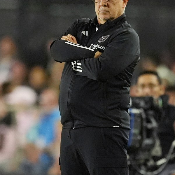 Inter Miami head coach Gerardo "Tata" Martino stands on the sidelines during the first half of an MLS playoff opening round soccer match against Atlanta United, Saturday, Nov. 9, 2024, in Fort Lauderdale, Fla. (AP Photo/Rebecca Blackwell)