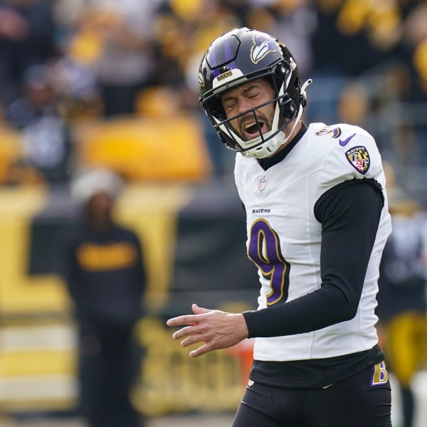 Baltimore Ravens kicker Justin Tucker reacts after missing a second field goal attempt against the Pittsburgh Steelers during the first half of an NFL football game, Sunday, Nov. 17, 2024, in Pittsburgh. (AP Photo/Matt Freed)