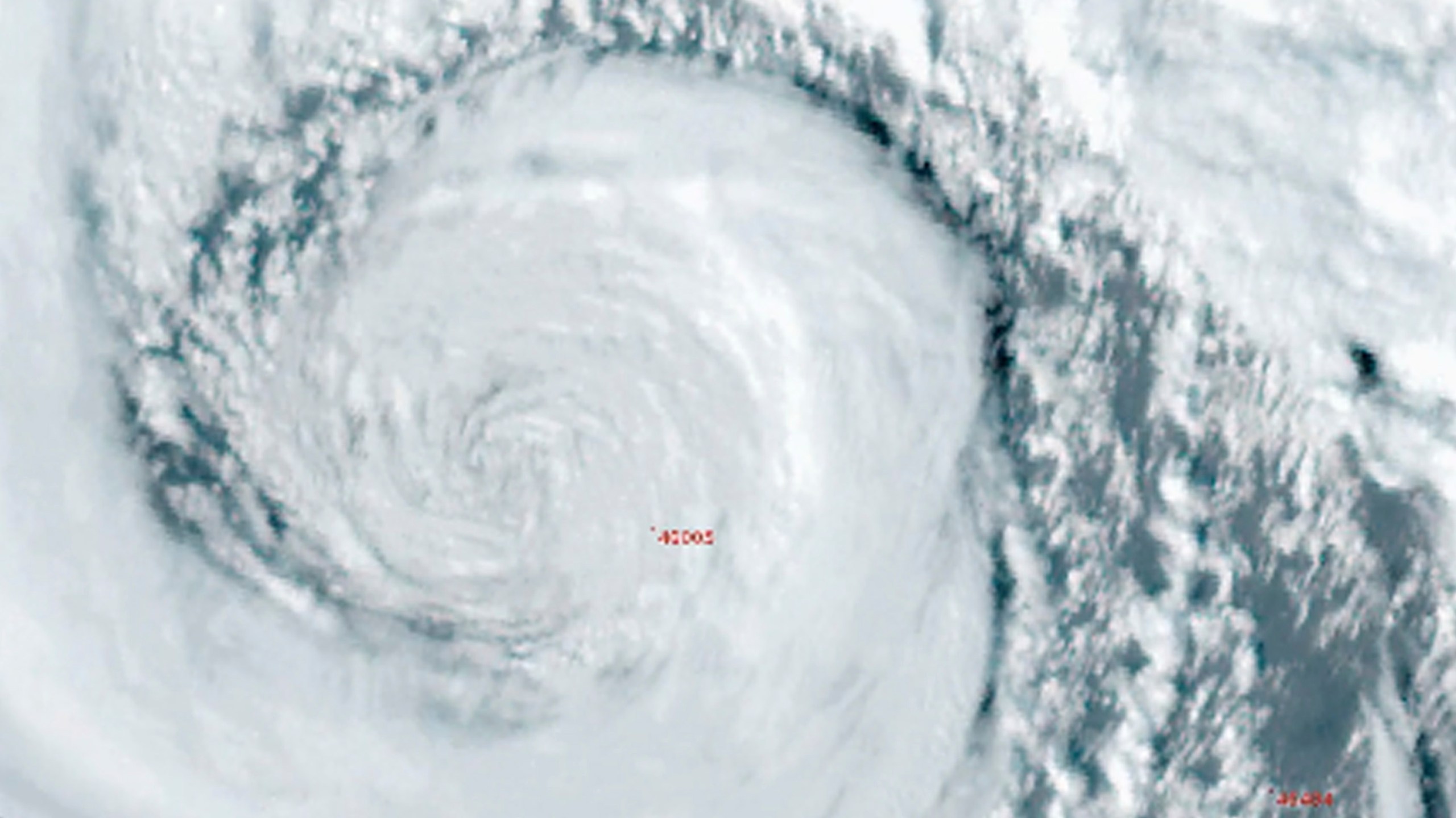 In this image made from video provided by National Weather Service Portland a powerful storm also called a 'bomb cyclone' rotates off the U.S. West Coast on Tuesday, Nov. 19, 2024. (National Weather Service Portland via AP)