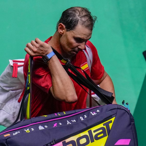 Spain's tennis player Rafael Nadal leaves the court after losing against Netherlands' Botic Van De Zandschulp during a Davis Cup quarterfinal match at Martin Carpena Sports Hall in Malaga, southern Spain, on Tuesday, Nov. 19, 2024. (AP Photo/Manu Fernandez)