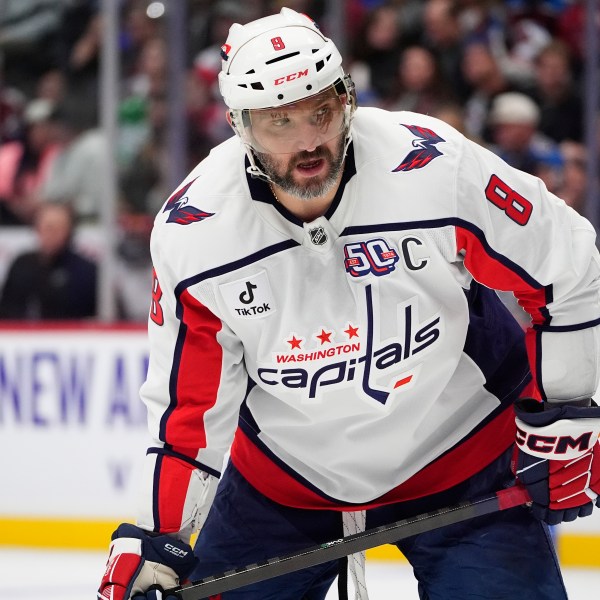 Washington Capitals left wing Alex Ovechkin waits for a face off in the second period of an NHL hockey game against the Colorado Avalanche, Friday, Nov. 15, 2024, in Denver. (AP Photo/David Zalubowski)