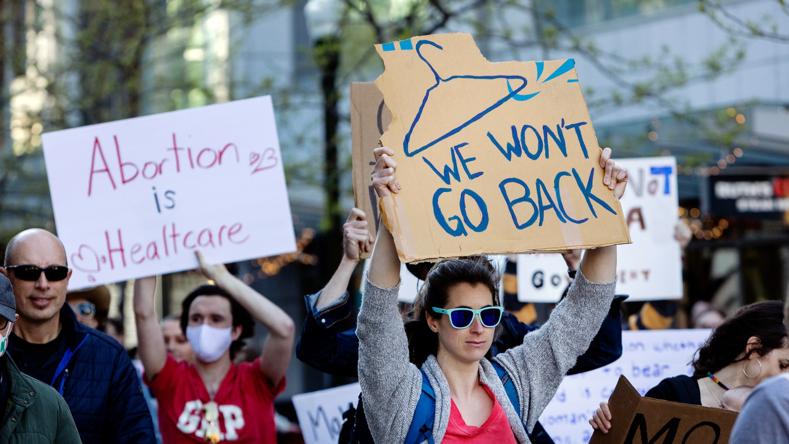 FILE - People march through 8th Street in downtown Boise, Idaho, on May 3, 2022, in response to the news that the U.S. Supreme Court could be poised to overturn the landmark Roe v. Wade case that legalized abortion nationwide. (Sarah A. Miller/Idaho Statesman via AP, File)