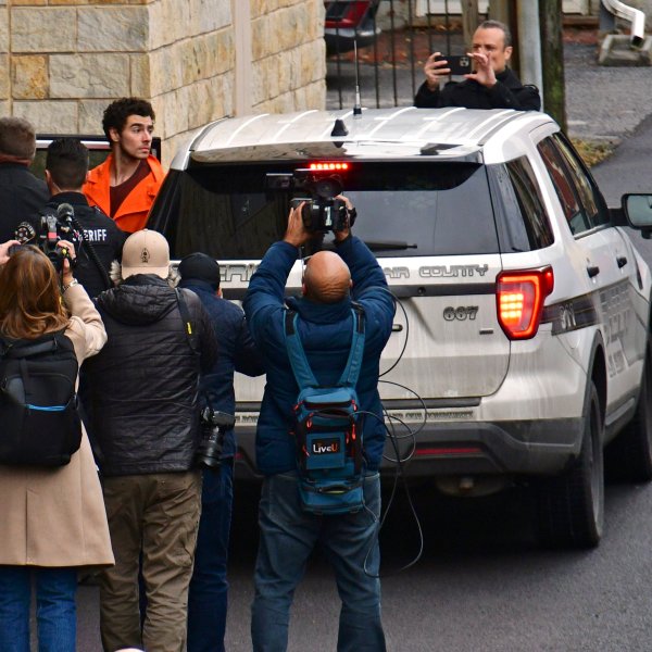 Suspect Luigi Mangione is taken into the Blair County Courthouse on Tuesday, Dec. 10, 2024, in Hollidaysburg, Pa. (Janet Klingbeil via AP)