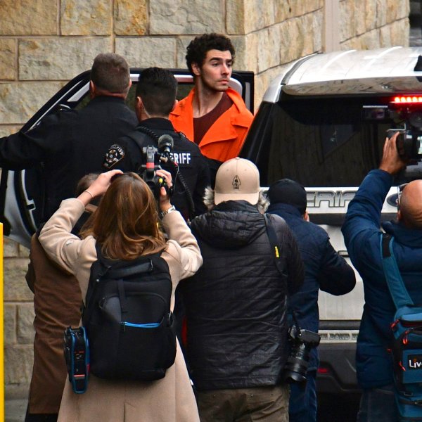 Suspect Luigi Mangione is taken into the Blair County Courthouse on Tuesday, Dec. 10, 2024, in Hollidaysburg, Pa. (Janet Klingbeil via AP)