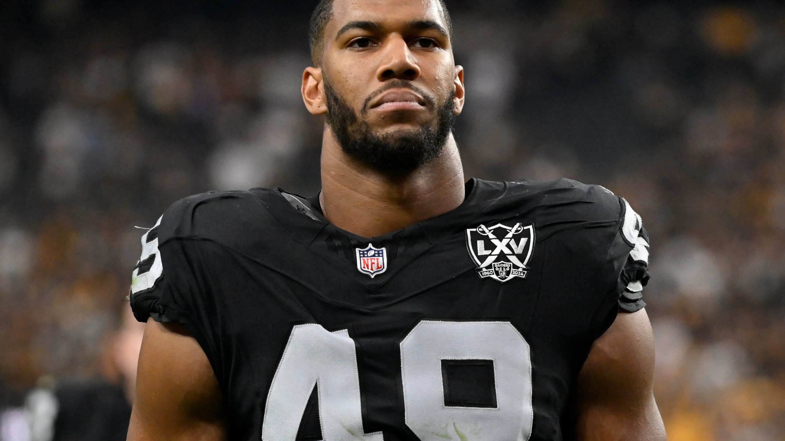 FILE - Las Vegas Raiders defensive end Charles Snowden walks off the field following an NFL football game against the Pittsburgh Steelers, Sunday, Oct 13, 2024, in Las Vegas. (AP Photo/David Becker, File)