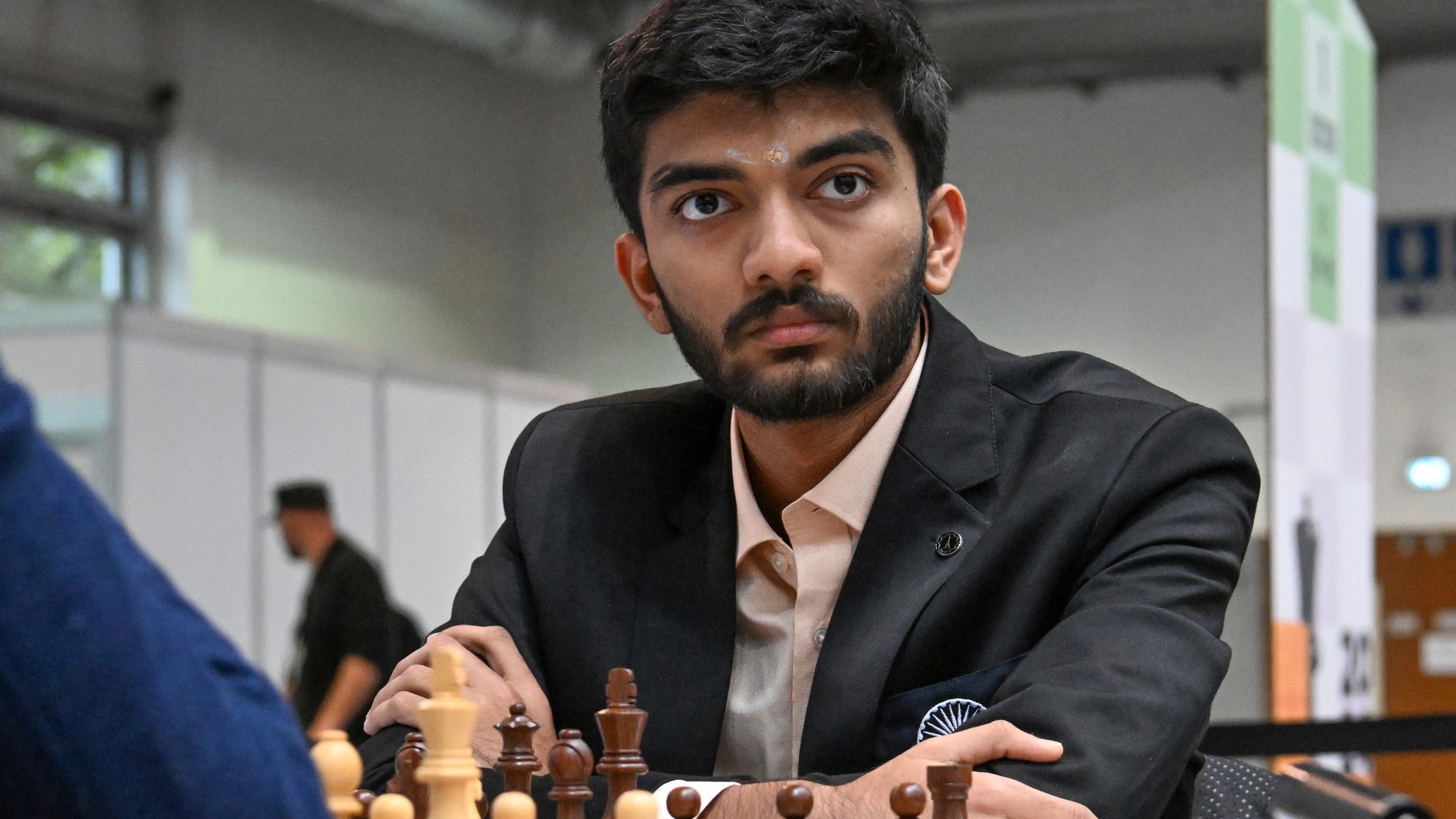 FILE - Gukesh D of India looks on as he plays against Richard Rapport of Hungary during the Hungary vs. India match in the 6th round of the 45th Chess Olympiad in Budapest, Hungary, Sept. 16, 2024. (Tibor Illyes/MTI via AP, File)