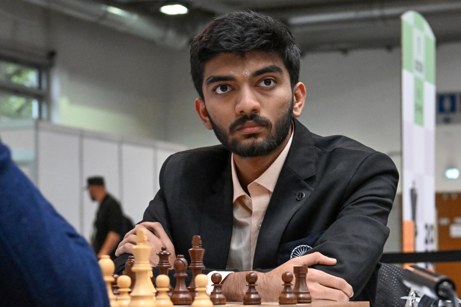 FILE - Gukesh D of India looks on as he plays against Richard Rapport of Hungary during the Hungary vs. India match in the 6th round of the 45th Chess Olympiad in Budapest, Hungary, Sept. 16, 2024. (Tibor Illyes/MTI via AP, File)