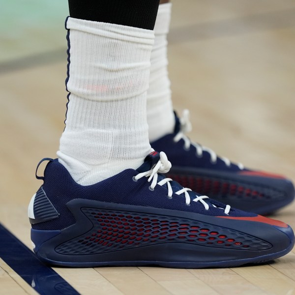 Minnesota Timberwolves guard Anthony Edwards stands on the court during the first half of an NBA basketball game against the Los Angeles Lakers, Friday, Dec. 13, 2024, in Minneapolis. (AP Photo/Abbie Parr)