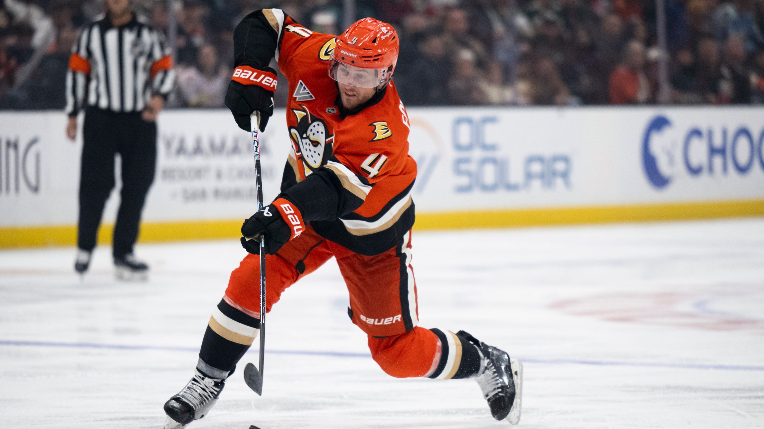 Anaheim Ducks defenseman Cam Fowler (4) shoots during the third period of an NHL hockey game against the Minnesota Wild, Friday, Dec. 6, 2024, in Anaheim, Calif. (AP Photo/Kyusung Gong)