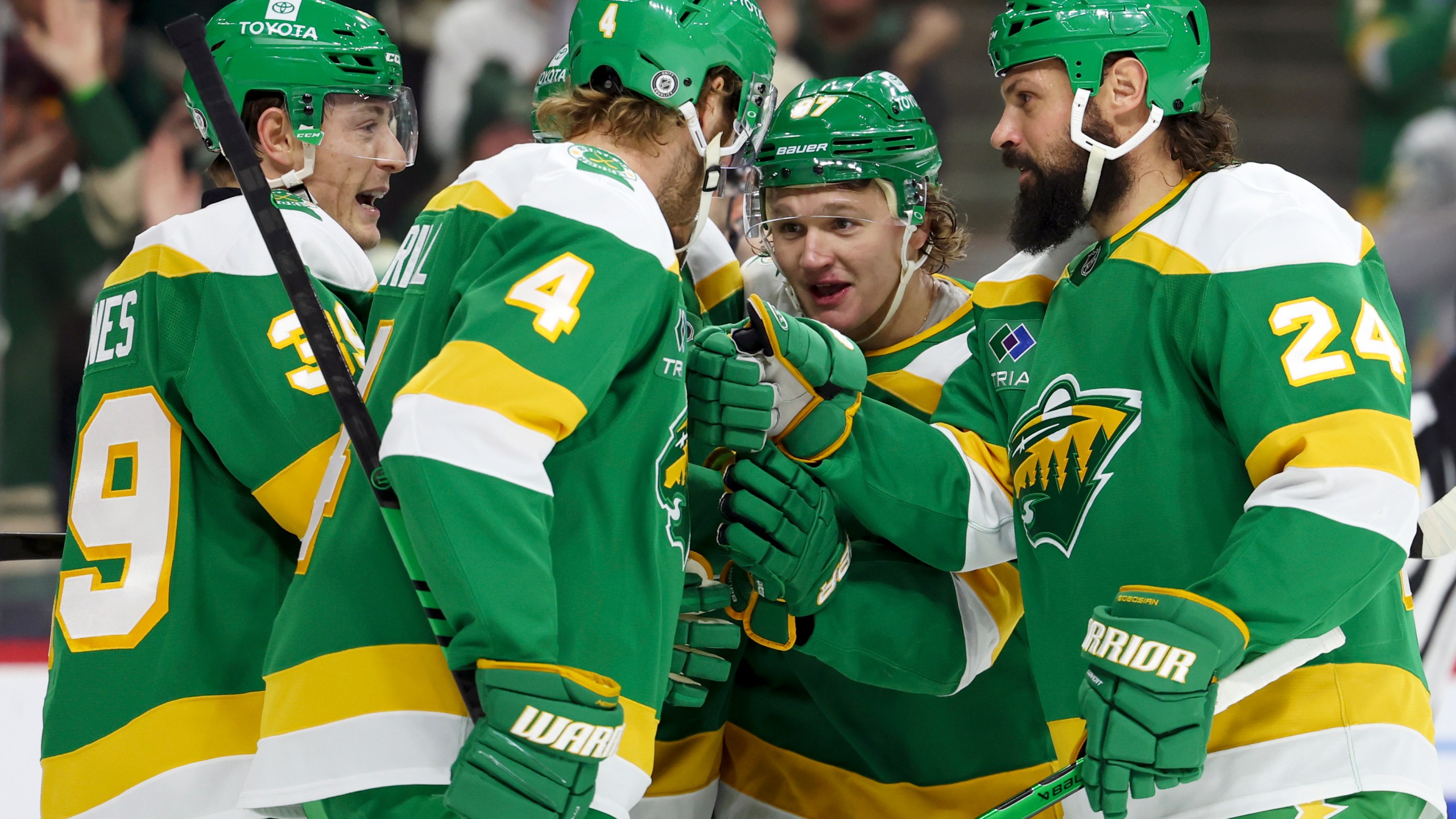 Minnesota Wild left wing Kirill Kaprizov, center right, celebrates his goal with his teammates during the first period of an NHL hockey game against the Philadelphia Flyers, Saturday, Dec. 14, 2024, in St. Paul, Minn. (AP Photo/Ellen Schmidt)