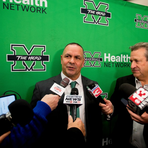 Marshall University's head football coach Tony Gibson responds to questions during a press conference on Thursday, Dec. 12, 2024, at the Brad D. Smith Center for Business and Innovation in Huntington, W.Va. (Ryan Fischer/The Herald-Dispatch via AP)