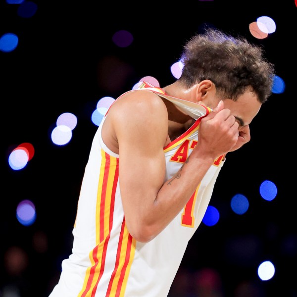 Atlanta Hawks guard Trae Young reacts after missing a 3-point basket during the second half of a semifinal game against the Milwaukee Bucks in the NBA Cup basketball tournament Saturday, Dec. 14, 2024, in Las Vegas. (AP Photo/Ian Maule)