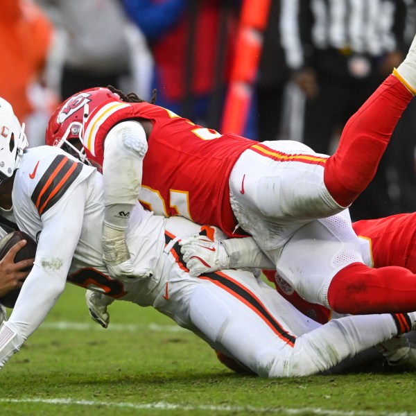 Kansas City Chiefs linebacker Nick Bolton (32) sacks Cleveland Browns quarterback Jameis Winston (5) during the second half of an NFL football game, Sunday, Dec. 15, 2024, in Cleveland. (AP Photo/David Richard)