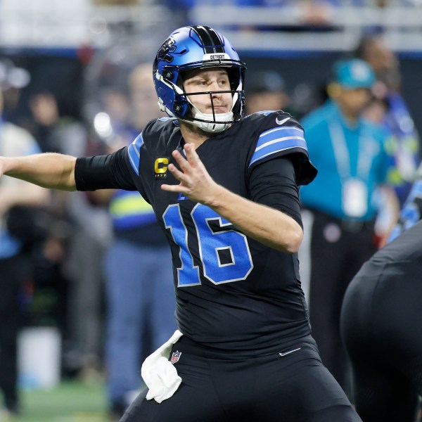 Detroit Lions quarterback Jared Goff (16) passes against the Buffalo Bills during the first half of an NFL football game, Sunday, Dec. 15, 2024, in Detroit. (AP Photo/Duane Burleson)