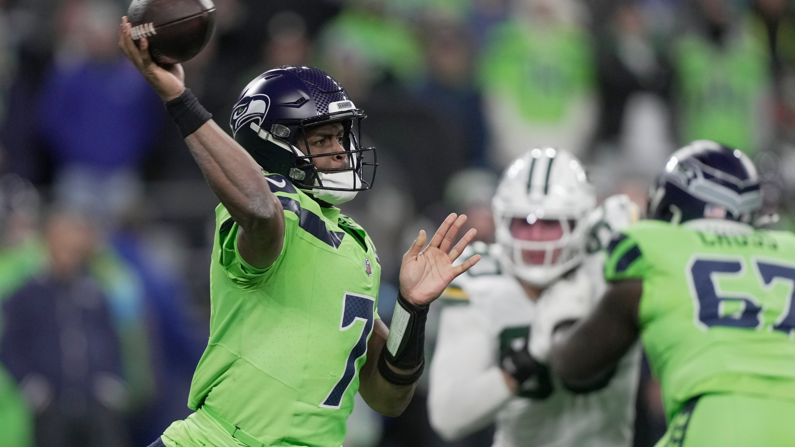 Seattle Seahawks' Geno Smith throws during the first half of an NFL football game against the Green Bay Packers Sunday, Dec. 15, 2024, in Seattle. (AP Photo/Stephen Brashear)