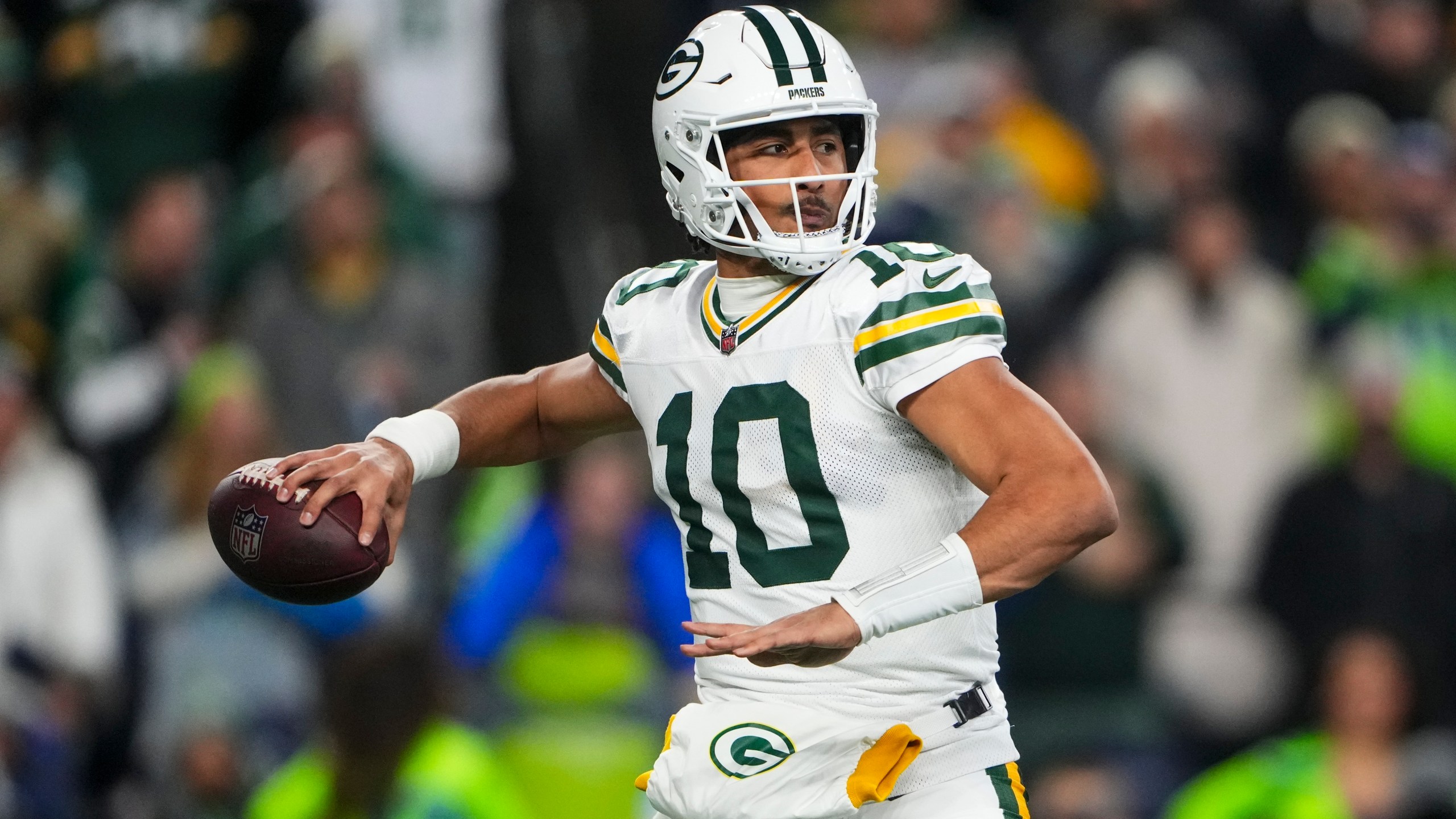 Green Bay Packers' Jordan Love throws during the first half of an NFL football game against the Seattle Seahawks Sunday, Dec. 15, 2024, in Seattle. (AP Photo/Lindsey Wasson)