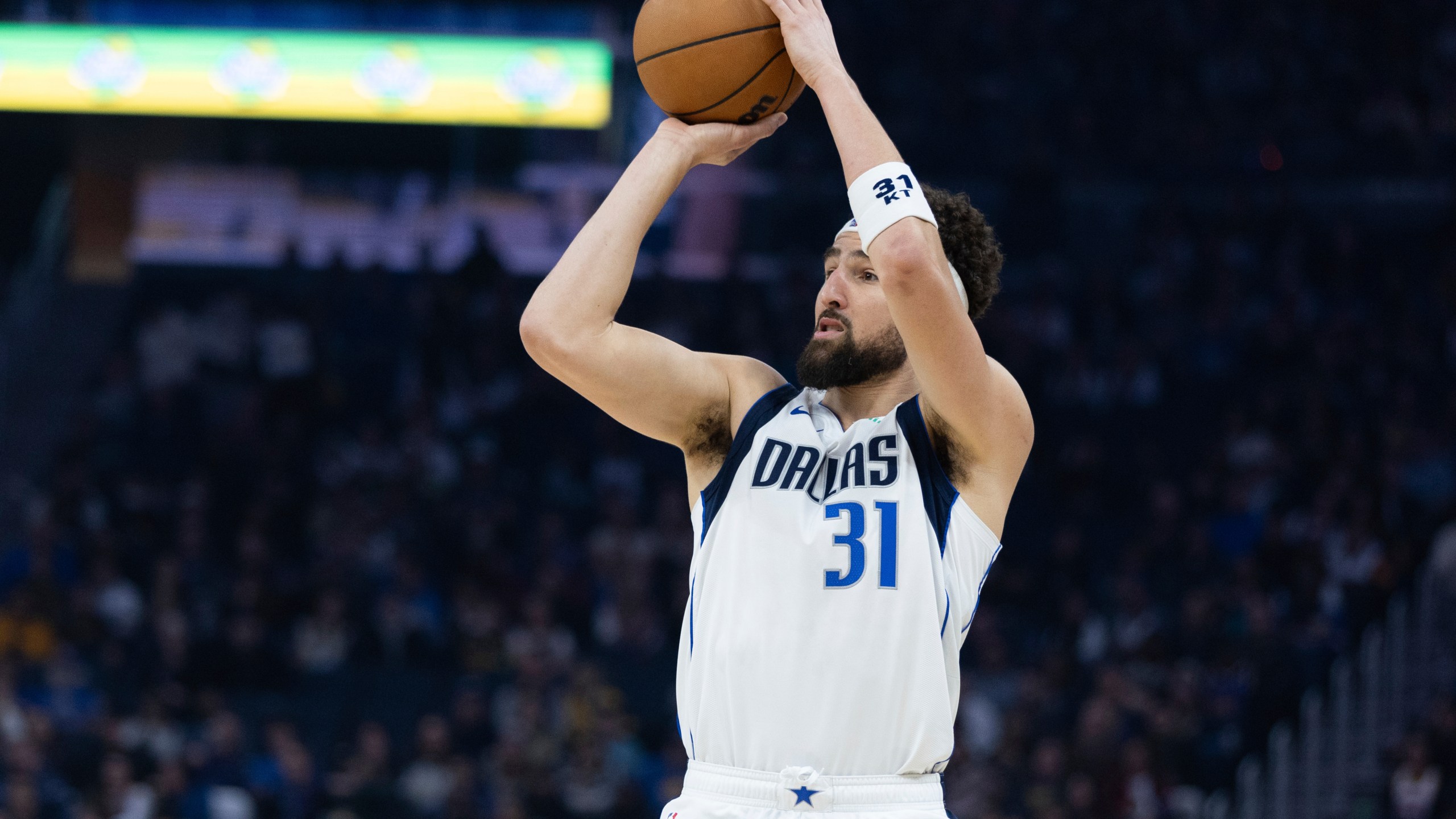 Dallas Mavericks guard Klay Thompson looks to shoot during the first half of an NBA basketball game against the Golden State Warriors, Sunday, Dec. 15, 2024, in San Francisco. (AP Photo/Benjamin Fanjoy)