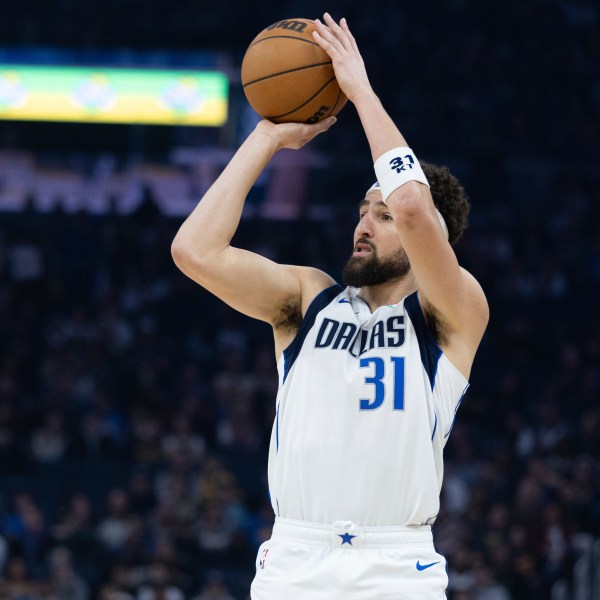 Dallas Mavericks guard Klay Thompson looks to shoot during the first half of an NBA basketball game against the Golden State Warriors, Sunday, Dec. 15, 2024, in San Francisco. (AP Photo/Benjamin Fanjoy)