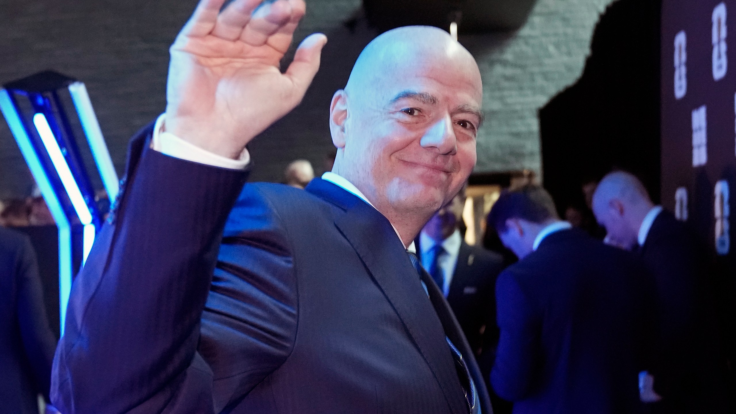 FIFA president Gianni Infantino waves at the UEFA Preliminary Draw for the 2026 FIFA World Cup at FIFA headquarters in Zurich, Switzerland, Friday, December 13, 2024. (AP Photo/Martin Meissner)