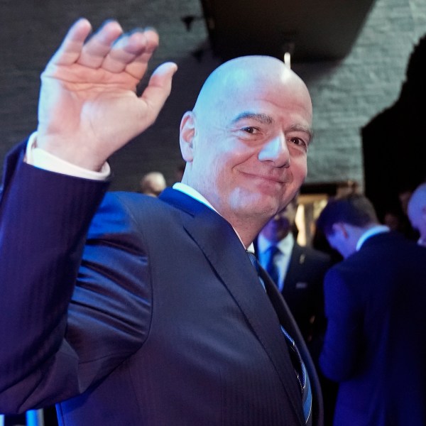 FIFA president Gianni Infantino waves at the UEFA Preliminary Draw for the 2026 FIFA World Cup at FIFA headquarters in Zurich, Switzerland, Friday, December 13, 2024. (AP Photo/Martin Meissner)