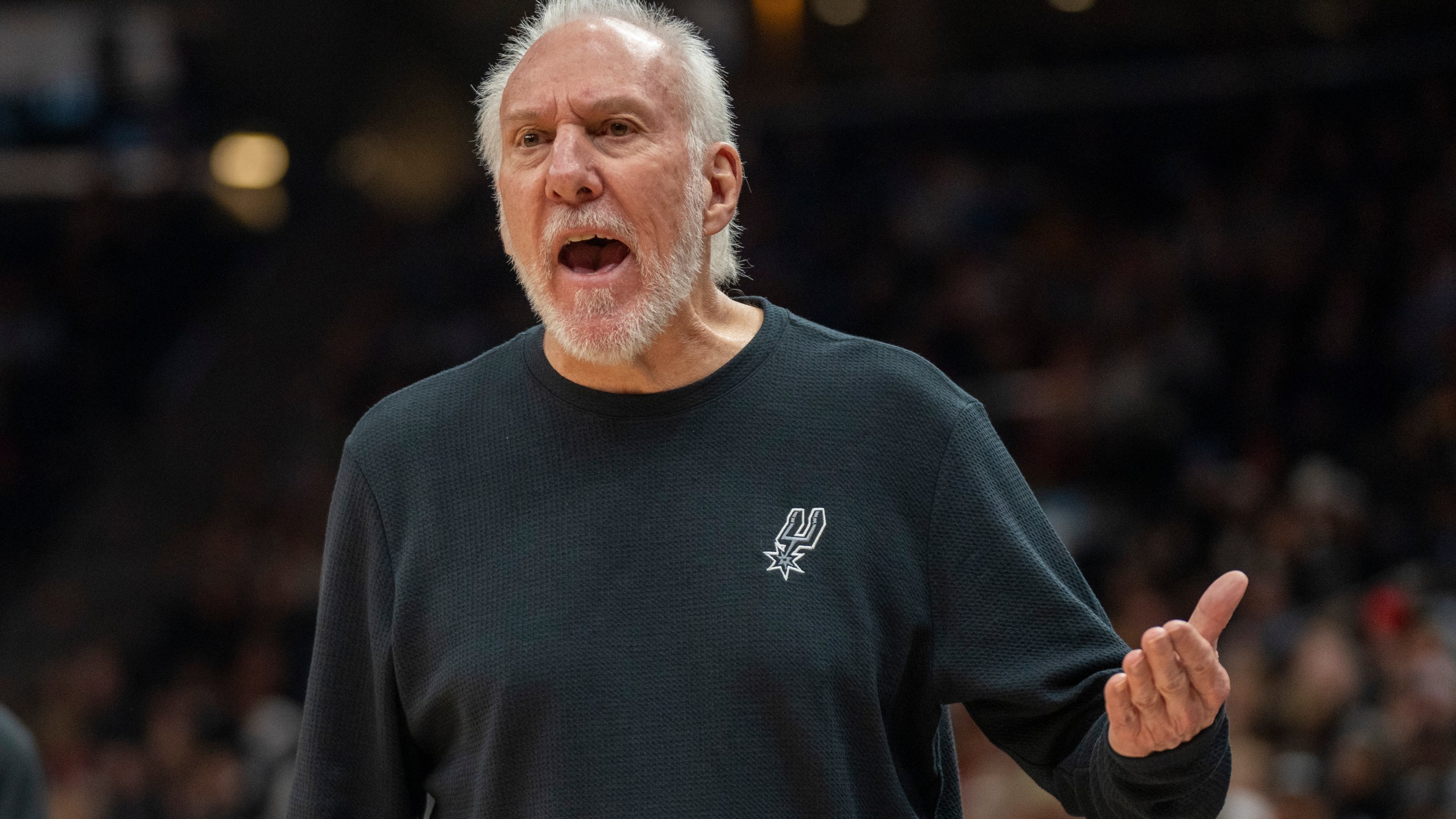 FILE - San Antonio Spurs head coach Gregg Popovich reacts after a call by the official, during the second half of an NBA basketball game, Thursday, Oct. 31, 2024, in Salt Lake City. (AP Photo/Rick Egan, File)