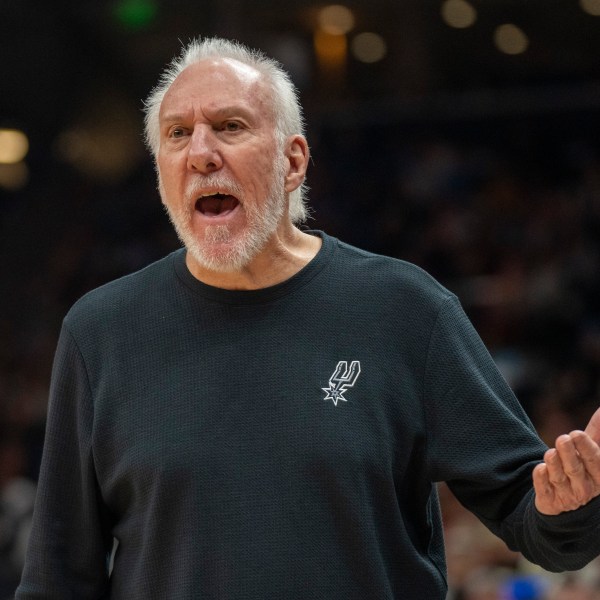 FILE - San Antonio Spurs head coach Gregg Popovich reacts after a call by the official, during the second half of an NBA basketball game, Thursday, Oct. 31, 2024, in Salt Lake City. (AP Photo/Rick Egan, File)