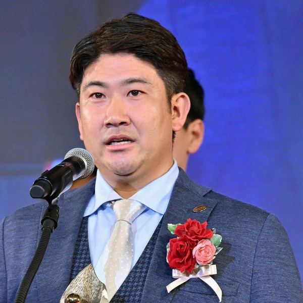 Yomiuri Giants Tomoyuki Sugano delivers his speech as he received Japan's Central League MVP in Tokyo Nov. 26, 2024. (Japan Pool/Kyodo News via AP)