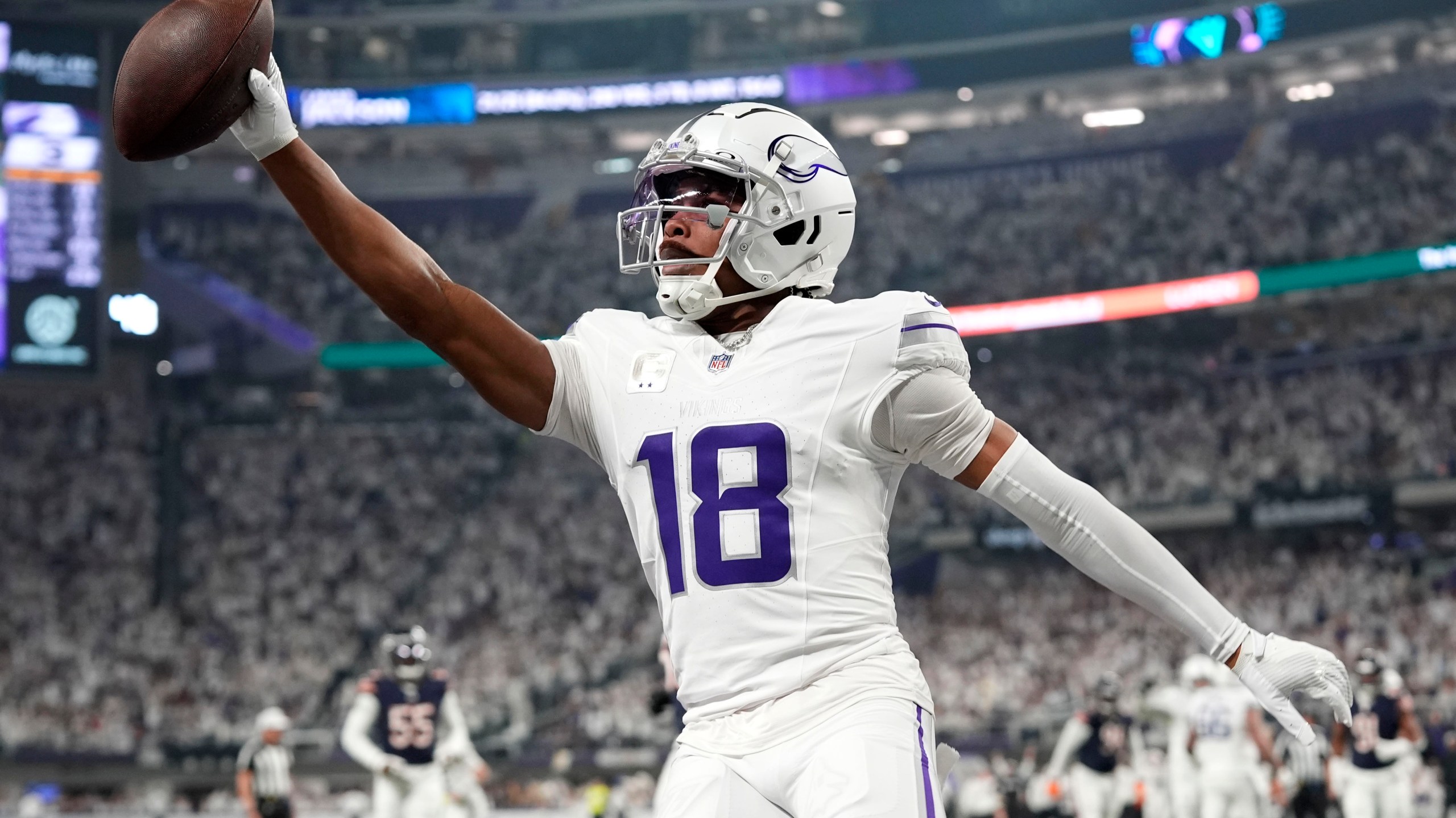 Minnesota Vikings wide receiver Justin Jefferson celebrates after catching a 7-yard touchdown pass during the first half of an NFL football game against the Chicago Bears, Monday, Dec. 16, 2024, in Minneapolis. (AP Photo/Abbie Parr)