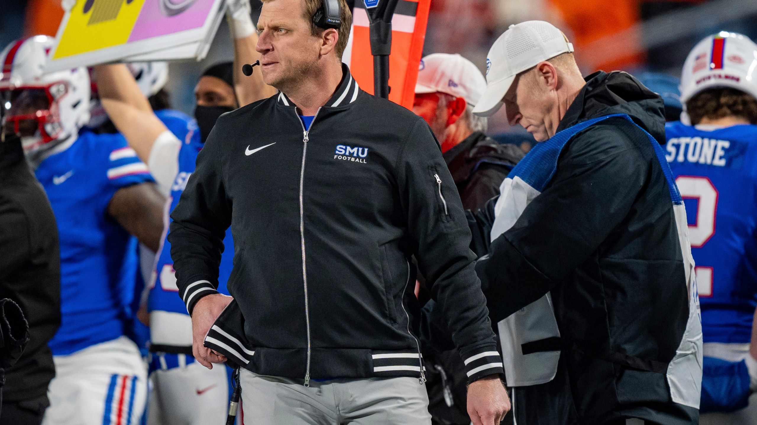 SMU head coach Rhett Lashlee looks on in the first half of the Atlantic Coast Conference championship NCAA college football game against Clemson, Saturday, Dec. 7, 2024, in Charlotte, N.C. (AP Photo/Jacob Kupferman)